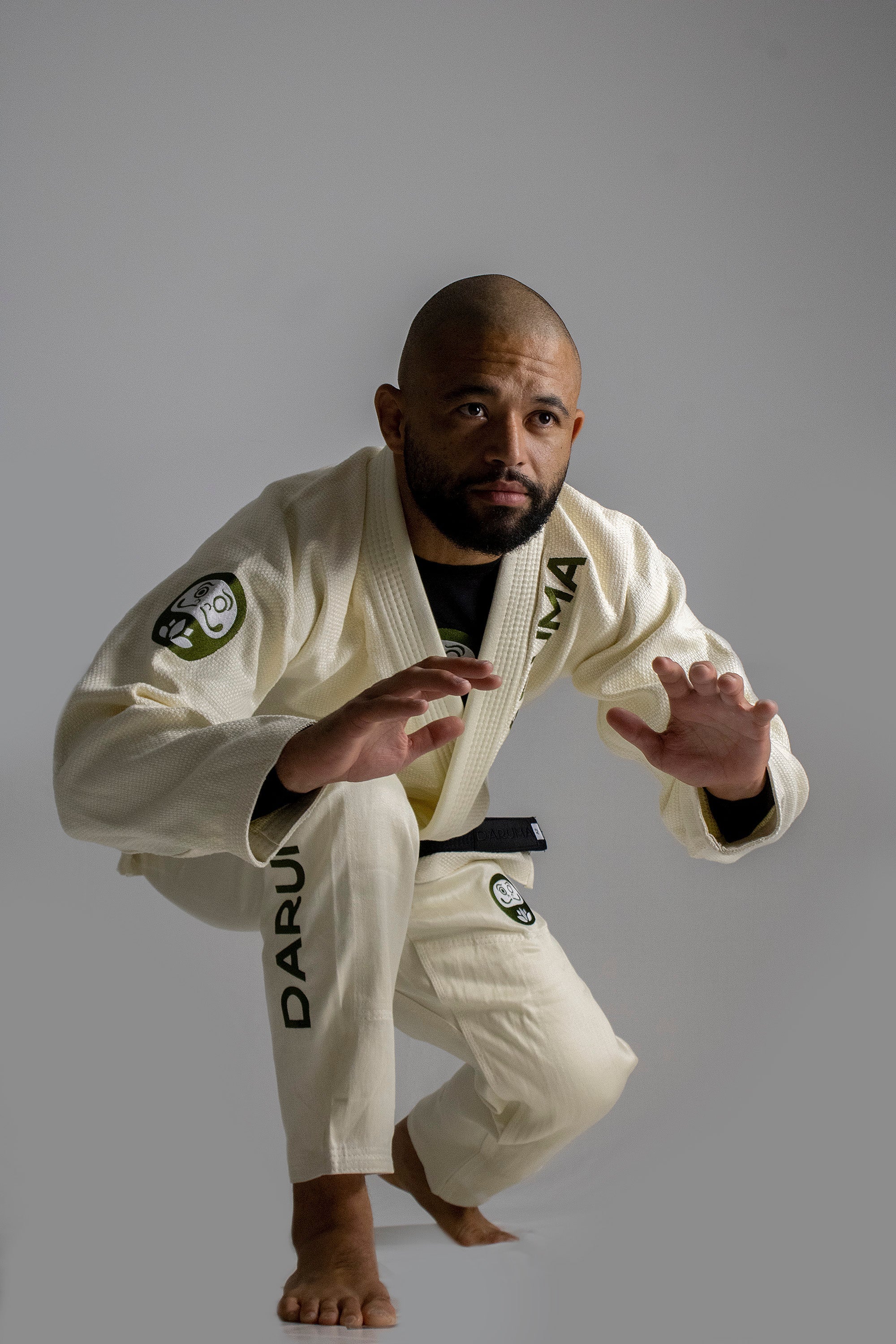 Athlete training in a natural white Daruma hemp Gi